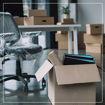 moving-office-furniture-in-capetown wrapped boxes of office moving